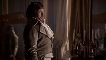 The Duellists: Albert Finney stands by in front of mirror.