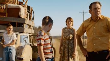 The Hill Movie: In the 1950s, Dennis Quaid stands, frustrated, in front of a truck overflowing with belongings