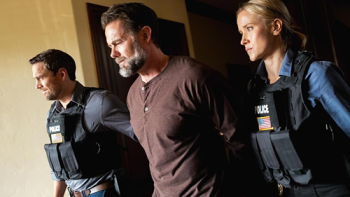 The Huntsman movie: Jessy Schram and Brent Bailey walk Garret Dillahunt out of his home in handcuffs