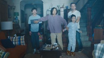 The Last House: Greta Lee protects her children.
