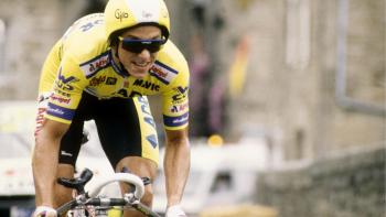 The Last Rider: A young Greg LeMond on his bike with a yellow helmet and jacket and sunglasses