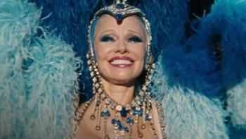 The Last Showgirl movie: Pamela Anderson smiles widely while on stage performing