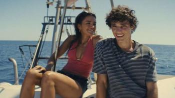 The Last Sunrise: Maia Reficco and Fernando Lindez on the beach.