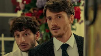 The Love Scam: Brothers peek around a corner.