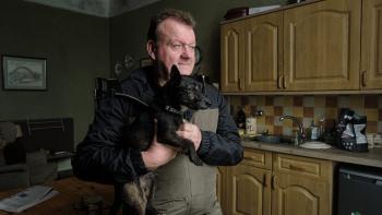 The Old Oak: Dave Turner holds his dog Marra in the kitchen