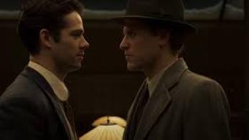 The Outfit Movie: Dylan O'Brien and Johnny Flynn look threateningly at each other