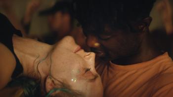 The Outrun: Saoirse Ronan lies upside down with her head back to kiss Paapa Essiedu in a nightclub