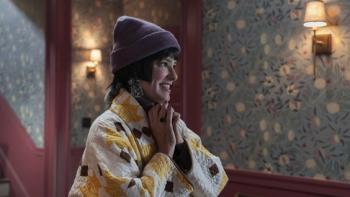 The Parenting: Parker Posey in a hat.