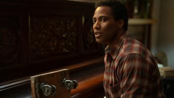 The Piano Lesson movie: John David Washington sits at the piano
