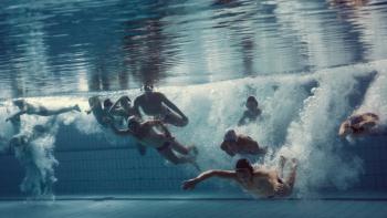 The Plague movie: Boys are shown diving into the water