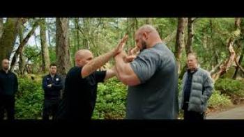 The Power of Chi: a smaller man tips a large man off balance