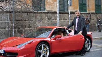 The Price of Family: Dad enjoys his new Ferrari.