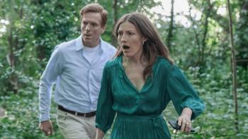The Radleys: Kelly Macdonald and Damian Lewis walking through the woods together looking concerned
