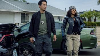 The Rip: Stephen Yeun and Teyana Taylor walking.