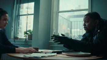 The Silent Hour: Sandra Mae Frank and Mekhi Phifer sit at a table in an apartment room next to some windows