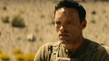 The Wages of Fear movie: French white man with short hair center right stands in the desert