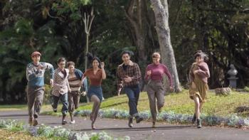 The Archies: The gang runs through a park.