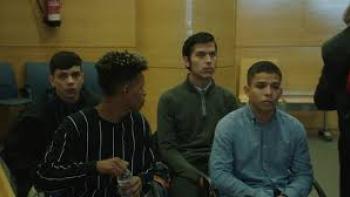 The Bad Family: Four boys sit together