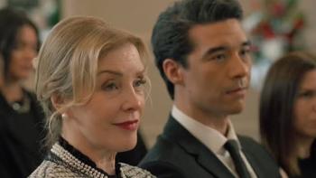 The Body in the Locker: White Woman and man in formal attire sitting attentively.