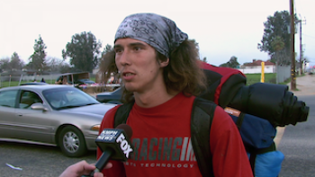 Caleb "Kai" McGillvary is interviewed by TV reporter Jessob Reisbeck. 