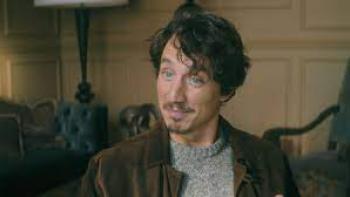 The Heartbreak Agency:  A White man sits