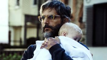 The Son Movie: Lorenzo holds the baby