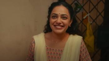 Thiruchitrambalam: A young Indian woman smiles toward the camera