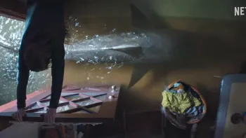 Thrash: Sharks entering a flooded house.