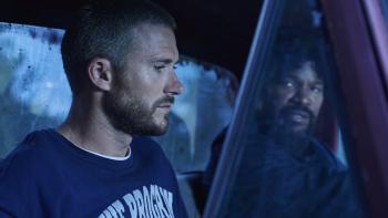 Tin Soldier Movie: Nash (Scott Eastwood), wearing a "The Program" sweatshirt, rides in a truck with the Bokushi (Jamie Foxx)