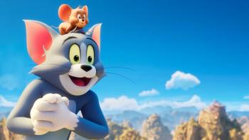 Tom and Jerry: Forbidden Compass Movie: Tom, with Jerry on his head, against a blue sky and clouds background