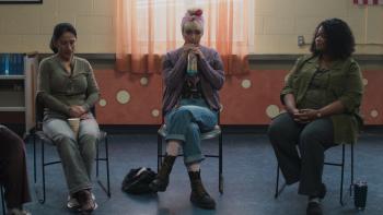 Tow movie: Rose Byrne sips an Arizona tea while sitting on folding chairs at an AA meeting