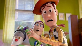 Toy Story 5 movie: Woody and Buzz look frightened, grabbing each other