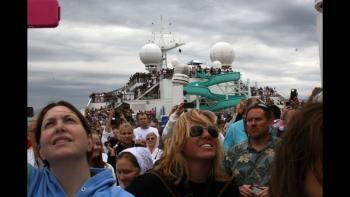 Trainwreck: Poop Cruise movie: Passengers on the Carnival Triumph flood the top deck trying to get phone signals