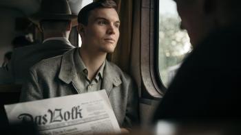 Truth & Treason Movie: A young man looks out a train window