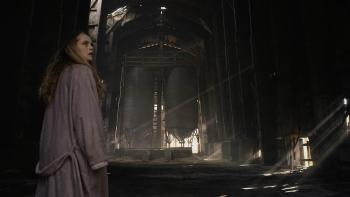 The Twin Movie: Wearing a ratty bathrobe, Rachel tentatively explores a massive, abandoned industrial building