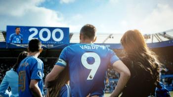 UK Untold: Jamie Vardy: Jamie Vardy in blue soccer jersey standing with family, while the stadium scoreboard shows "200"