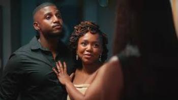 Umjolo: A Black man and woman touch  with affection