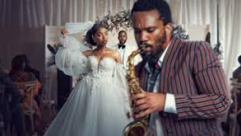 Umjolo: My Beginning, My End!: Black man and woman in wedding dress