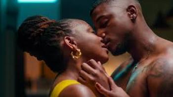 Umjolo: A Black man and woman kiss