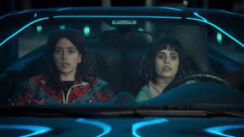 (Un)lucky Sisters:  two women in a car