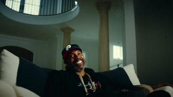 Untold: Jail Blazers movie: Rasheed Wallace smiles while sitting on a couch