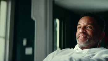 Untold: Jail Blazers movie: Damon Stoudamire leans back and smiles while sitting in a chair