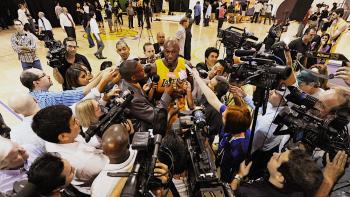 Untold: The Death & Life of Lamar Odom movie: Lamar Odom stands in his Lakers uniform, surrounded by the press