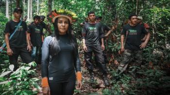 We Are Guardians: a group of Indigenous peoples of the Amazon stand together in the rain forest