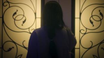 What Jennifer Did movie: Silhouette of Asian American woman entering spiral decorated doors
