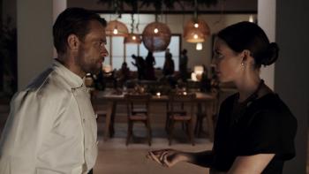 What You Wish For Movie: Wearing a chef's uniform, Ryan (left) discusses the menu with Imogene (Tamsin Topolski, right)