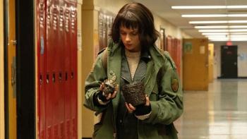 Whistle Movie: Chrys (Dafne Keen) examines the whistle and its heavy stone case, which she found in her school locker