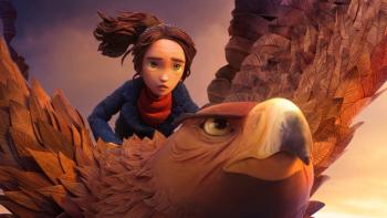 Wildwood film still: Prue rides a large eagle through the sky at sunset