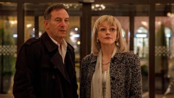 Words of War: Jason Isaacs and Maxine Peak stand next to each other in the lobby of a building