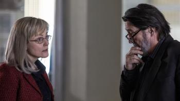 Words of War: Maxine Peake and Ciarán Hinds stand together in an office, deep in conversation